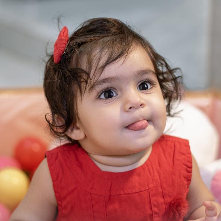 Avery Chen, Lead Design Curator at Frosted Bridge Hub, reviewing corporate floral arrangements